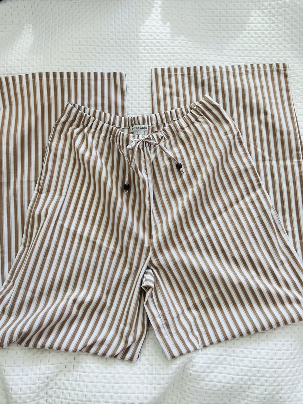 Christian Lacroix wide leg pants. 
Size S will fit M.